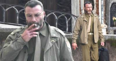 Liev Schreiber puffs a cigarette while sporting military uniform - www.msn.com - USA