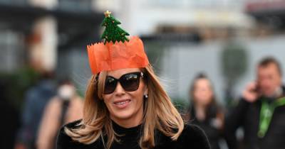 Amanda Holden dons hilarious Christmas cracker hat as she leaves Heart FM studios - www.ok.co.uk