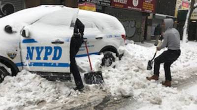 America Together: Good Samaritan helps NYPD officer shovel police cruiser out of snow pile up - www.foxnews.com - New York
