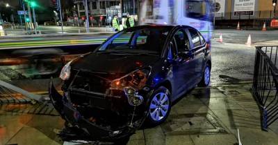 Police swoop on the city centre after car crashes through railings 'following pursuit' - www.manchestereveningnews.co.uk - Manchester