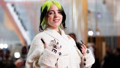 Billie Eilish Smacks Herself Cracks Up While Rocking A Cozy Tank Top On The Couch - hollywoodlife.com
