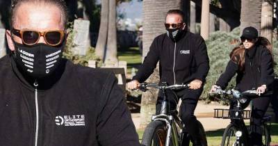 Arnold Schwarzenegger and daughter Christina ride bikes in LA - www.msn.com - Los Angeles - California