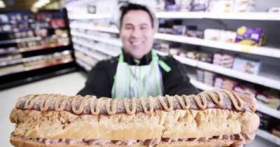 Asda is selling a huge chocolate and caramel eclair for £5 and it feeds 10 people - www.ok.co.uk