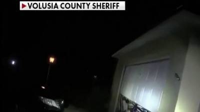 Florida deputies seen in video nabbing home invasion suspects who tied up family, carrying girl to safety - www.foxnews.com