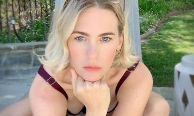 January Jones showcases incredible figure in plunging swimsuit - and fans are lost for words! - hellomagazine.com