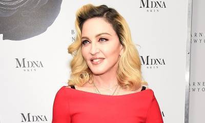 Madonna displays impressive figure as she shows off her 'beautiful scar' - hellomagazine.com