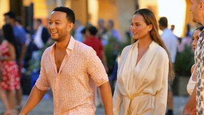 Chrissy Teigen Goes Hiking In A Plunging Black Swimsuit With John Legend During Much Needed Vacation - hollywoodlife.com - France