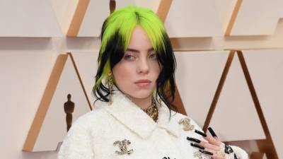 Billie Eilish posts fiery rebuttle to fans criticizing her green-and-black hair: 'Shut up!' - www.foxnews.com