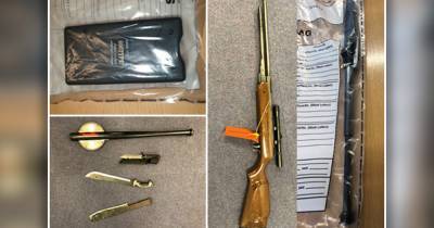 Suspected drugs, Taser, CS gas and weapons found during police raids in Salford - five people have been arrested - www.manchestereveningnews.co.uk