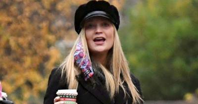 Laura Whitmore steps out for first time since pregnancy news as she flaunts baby bump in all black - www.ok.co.uk - London