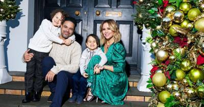 Inside Girls Aloud star Kimberley Walsh’s home at Christmas with stockings over the fireplace and huge trees - www.ok.co.uk