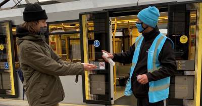 Metrolink staff hand out 500 face coverings to passengers in campaign to encourage mask-wearing - www.manchestereveningnews.co.uk - Manchester