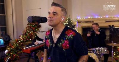 Robbie Williams performs four songs EXCLUSIVELY for Hits Radio - www.msn.com