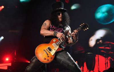 Slash says he anticipates new Guns N’ Roses music in 2021 - www.nme.com - China