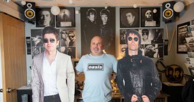 Mad fer it: Some might say John's the biggest Oasis fan ever... he's spent thousands on memorabilia, records and tattoos - and named his business after one of Liam's tunes - www.manchestereveningnews.co.uk