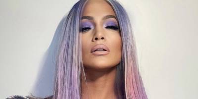 J.Lo Has a "Unicorn Barbie" Moment in a Long Multicolored Wig and a Silky Dress - www.marieclaire.com