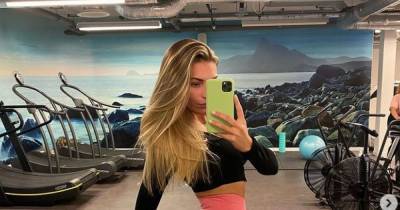 Zara McDermott shows off incredible curves and pert derriere as she poses in tight gym gear - www.ok.co.uk
