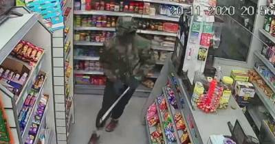 Thugs armed with machete and knife storm into store in terrifying robbery - www.manchestereveningnews.co.uk