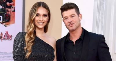 Robin Thicke’s Pregnant Fiancee April Love Geary Defends Nude Baby Bump Pic: It’s ‘My Body’ - www.usmagazine.com