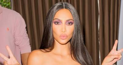Kim Kardashian’s Dress With Her Face on It Is the Most Kim Kardashian Look We’ve Ever Seen - www.usmagazine.com