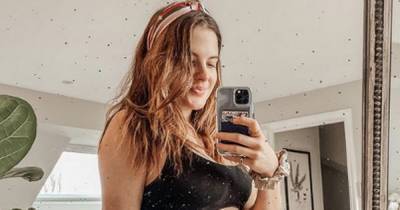 Binky Felstead shows off blossoming baby bump in sports bra and leggings days after announcing pregnancy - www.ok.co.uk - Chelsea