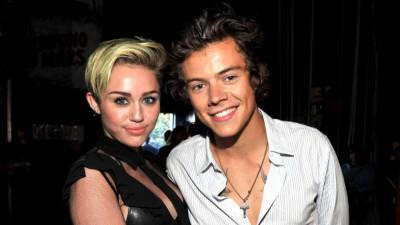 Miley Cyrus Says Harry Styles Is 'Looking Really Good': 'I'm Into the Fishnet' - www.etonline.com - Britain