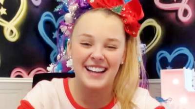 JoJo Siwa on New Holiday Music, Recovering From COVID-19 and Her Recent Breakup (Exclusive) - www.etonline.com