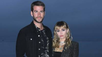 Miley Cyrus Says Marrying Liam Hemsworth 'Was One Last Attempt to Save Myself' - www.etonline.com