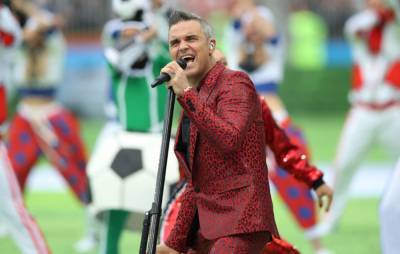Robbie Williams announces he’s forming a new band - www.nme.com - Australia - Britain