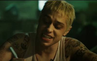 Watch Eminem join Pete Davidson for ‘Stan’ Christmas spoof - www.nme.com