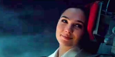Gal Gadot Pushes Two Cars Apart With Just Her Legs in New 'Wonder Woman 1984' Clip - www.justjared.com