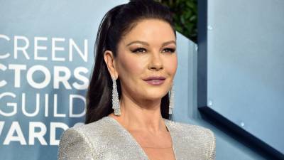 Catherine Zeta-Jones injures her foot while putting up holiday decorations: 'Pain was worse than labor' - www.foxnews.com