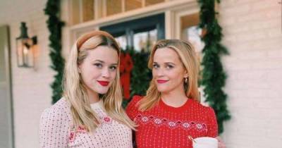Reese Witherspoon looks like daughter's 'twin' as they pose in matching Christmas jumpers - www.msn.com - France
