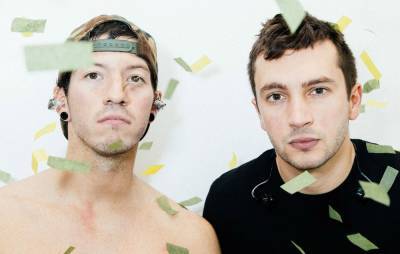 Twenty One Pilots release holiday single, ‘Christmas Saves The Year’ - www.nme.com