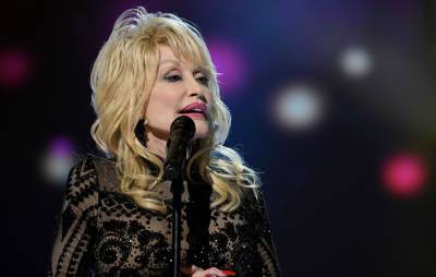 Dolly Parton to go on global stadium tour to mark her 75th birthday - www.nme.com