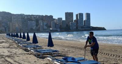 Benidorm reopens its beaches with safety rules but bans Brits until July 10 - www.manchestereveningnews.co.uk - Britain