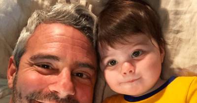 Andy Cohen's son adorably kisses doll of dad - www.wonderwall.com