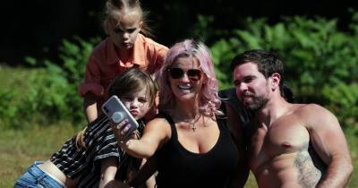Kerry Katona throws shade at exes as she claims new man Ryan Mahoney is 'real father figure' to her kids - www.ok.co.uk