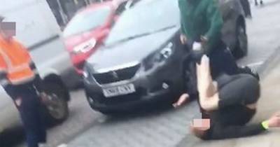 Council worker filmed flooring man in street brawl after allegedly being attacked in Midlothian - www.dailyrecord.co.uk