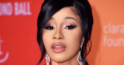 Cardi B Shares Footage of Herself Getting Chest and Lip Piercings: Watch - www.usmagazine.com