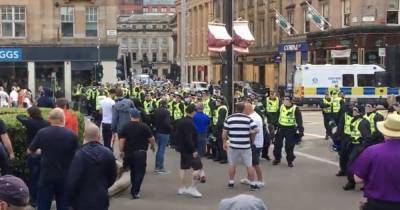 Six men arrested after Loyalists clash with asylum seeker protesters in Glasgow - www.dailyrecord.co.uk - city Glasgow