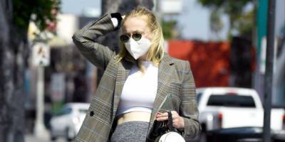 Sophie Turner Pairs a White Crop Top and Gray Leggings With a Plaid Blazer While Out With Joe Jonas - www.elle.com