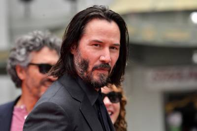 Keanu Reeves auctioning 15-minute date with himself for charity - nypost.com - state Idaho