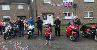 Hero's welcome for four-year-old Renfrew cyclist Harry after he raised thousands for the NHS - www.dailyrecord.co.uk