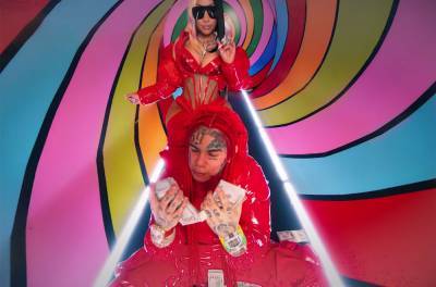 6ix9ine's Fans & Nicki Minaj's Barbz Praise Rappers' Reign Atop the Billboard Hot 100 With 'Trollz' - www.billboard.com