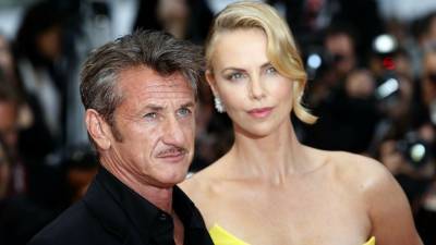 Charlize Theron Denies Sean Penn Engagement, Says They 'Never Moved In' - www.etonline.com