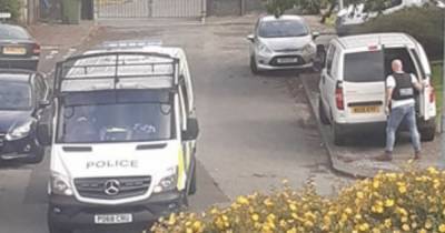 Man, 50, arrested after police find Taser and sawn-off shotgun during dawn raids in Salford - www.manchestereveningnews.co.uk - Manchester