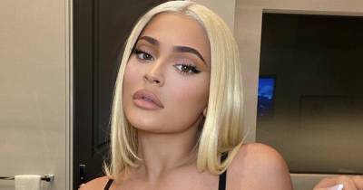 Kylie Jenner poses in sexy see-through bra as she unveils new platinum blonde hair - www.ok.co.uk
