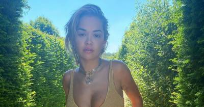 10 Times Rita Ora Has Shown Off Her Sexy Curves in Chic Swimsuits - www.usmagazine.com - Britain