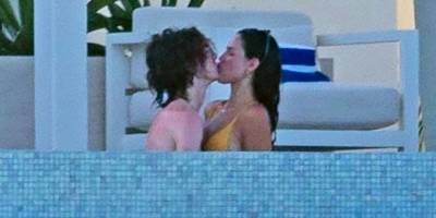 Spotted: Timothée Chalamet and Eiza González Passionately Making Out in a Pool - www.elle.com